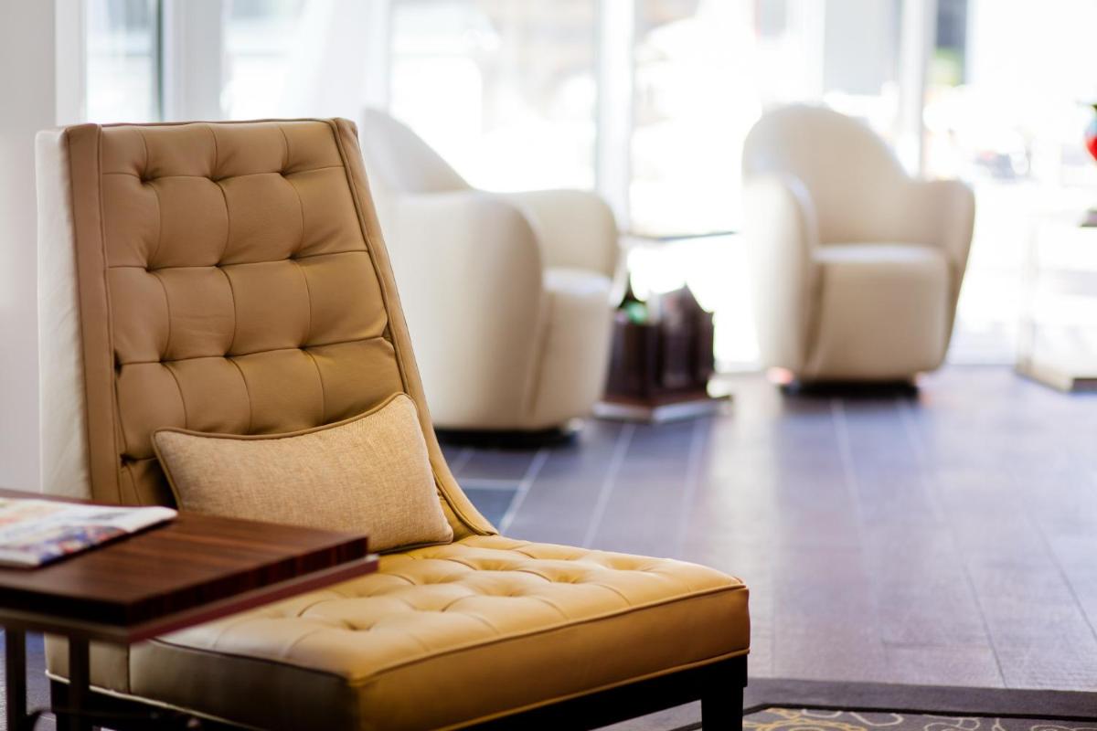 Coin salon dans l'établissement Hôtel et Spa La Villa K - Basel Airport
