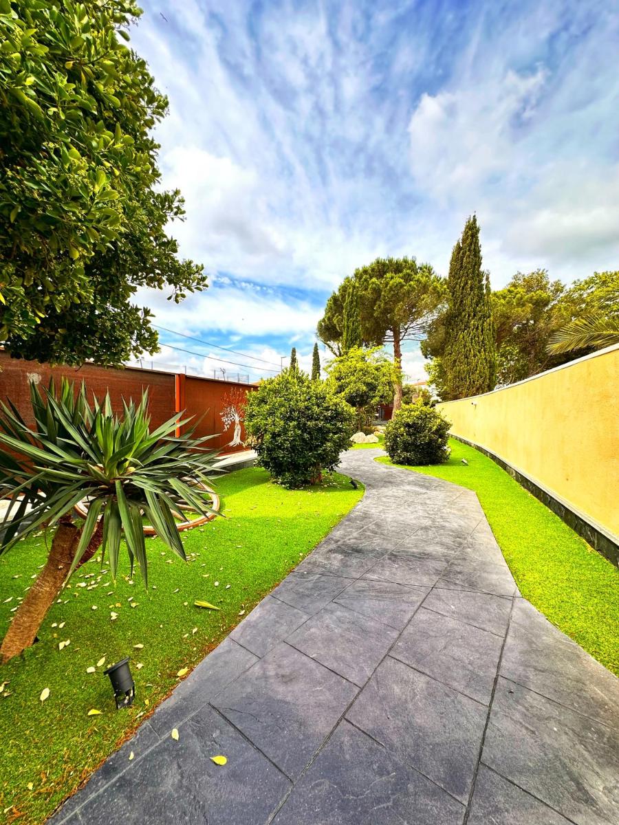 Jardín al aire libre en Boutique Hotel Comtal Empuries