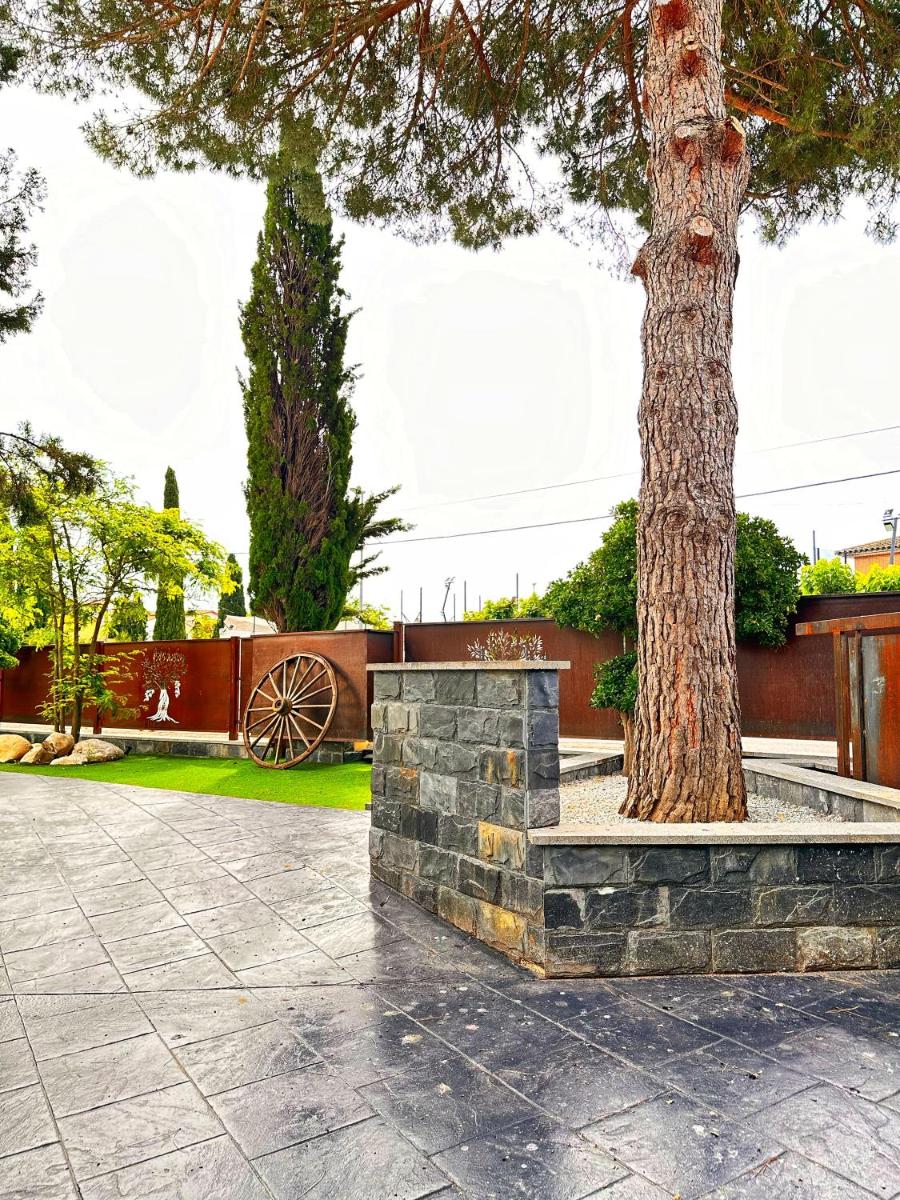 Jardín al aire libre en Boutique Hotel Comtal Empuries