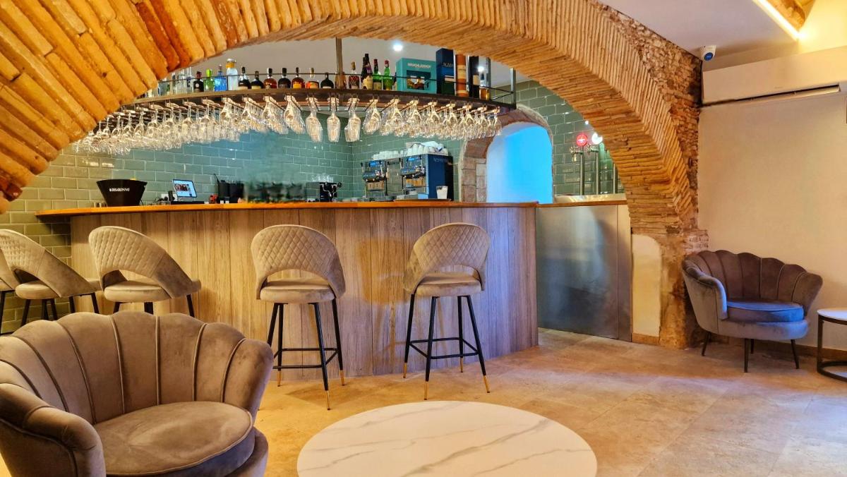 El salón o zona de bar de Boutique Hotel Comtal Empuries
