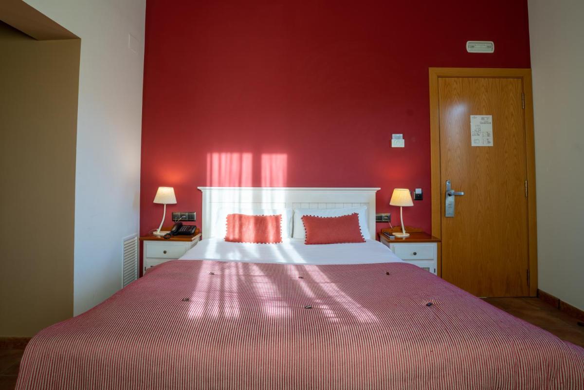 Cama o camas de una habitación en Hotel & Spa Golden Barcelona