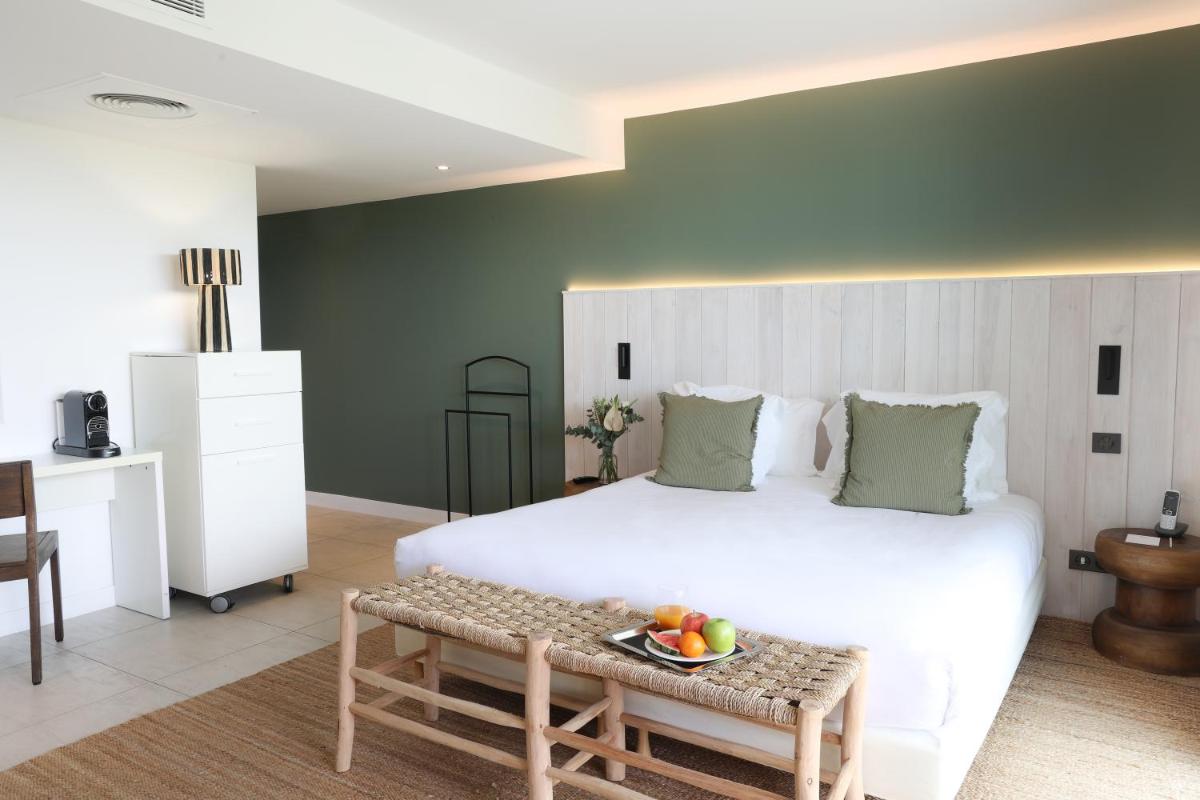 Un ou plusieurs lits dans un hébergement de l'établissement Hôtel & Spa Le Grand Large