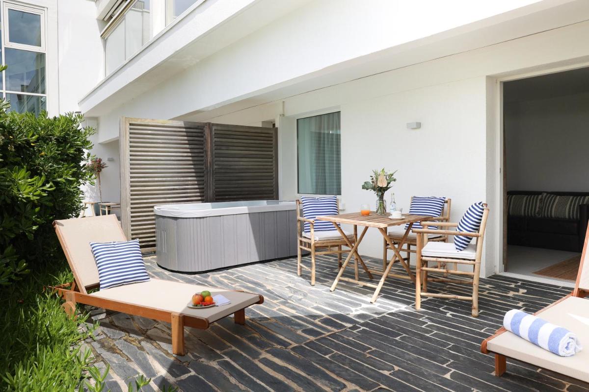 Balcon ou terrasse dans l'établissement Hôtel & Spa Le Grand Large