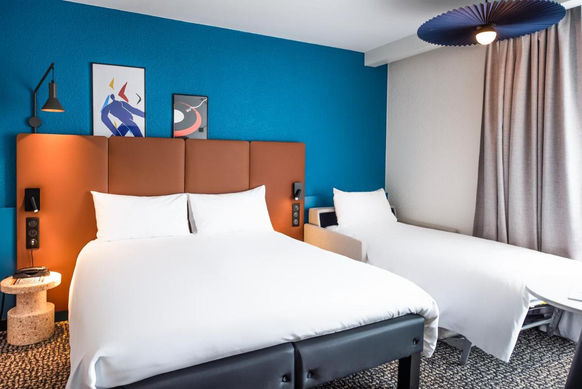 Un ou plusieurs lits dans un hébergement de l'établissement ibis La Baule Pornichet Plage