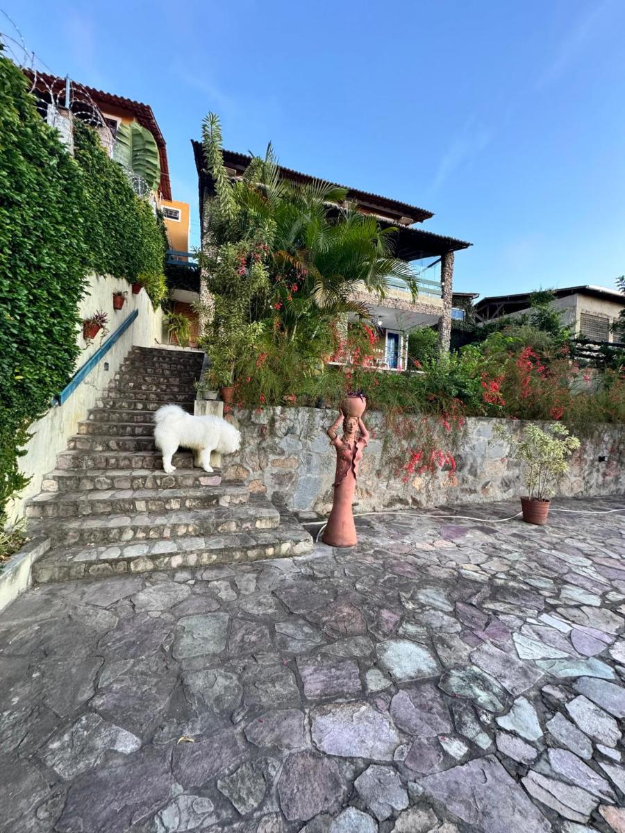 Casa Cantinho da Paz, seu lazer completo, churrasqueira, piscina e muita tranquilidade - Housity