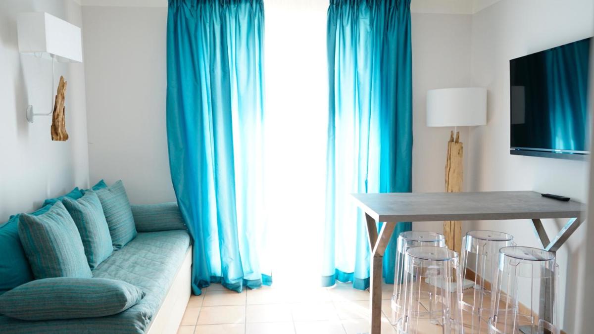 Télévision ou salle de divertissement dans l'établissement Le Cottage - Hotel & Spa