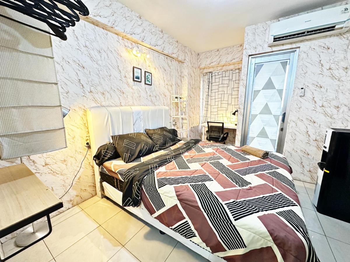 Minimalist Studio 1BR at Green Bay Pluit Apartment - Housity