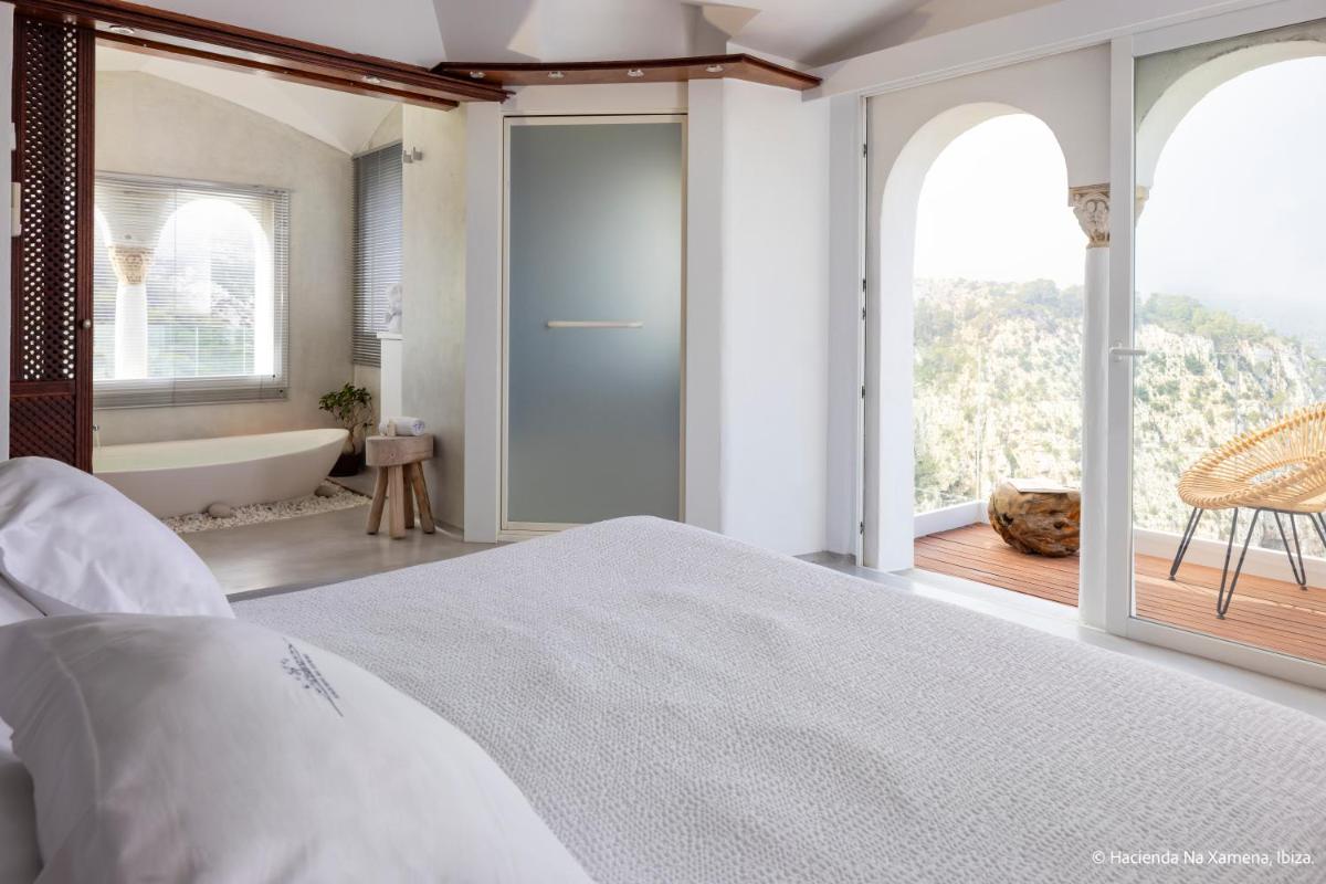 Cama o camas de una habitación en Hacienda Na Xamena, Ibiza