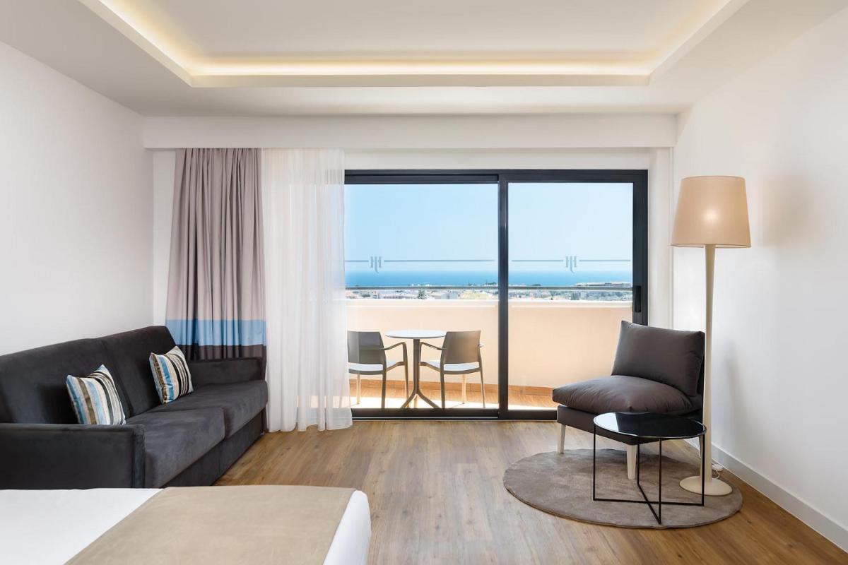 Uma área de estar em Jupiter Albufeira Hotel - Family & Fun - All Inclusive