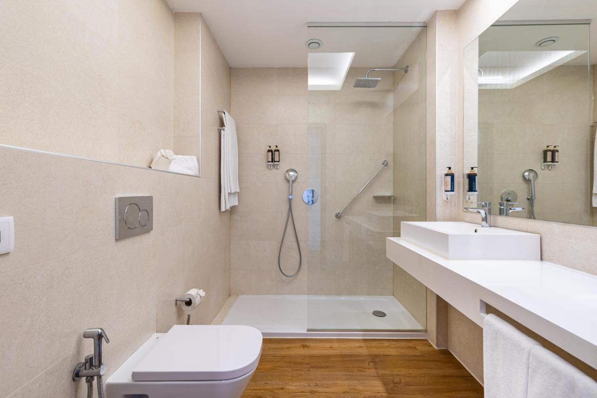 Uma casa de banho em Jupiter Albufeira Hotel - Family & Fun - All Inclusive