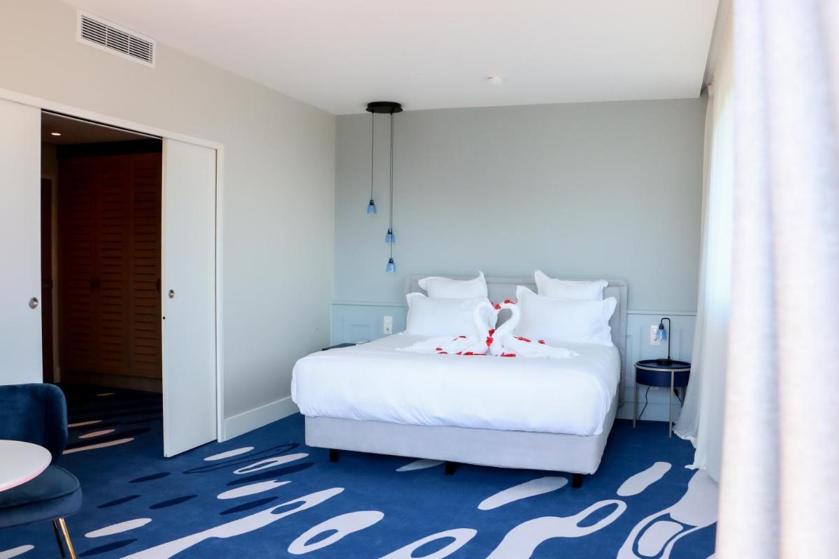 Un ou plusieurs lits dans un hébergement de l'établissement Eden Rose Grand Hotel BW Premier Collection