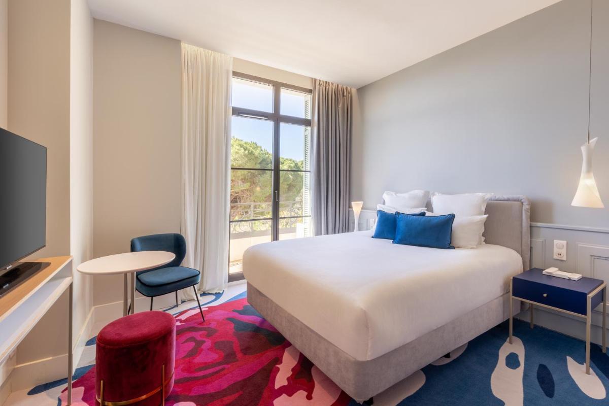 Un ou plusieurs lits dans un hébergement de l'établissement Eden Rose Grand Hotel BW Premier Collection