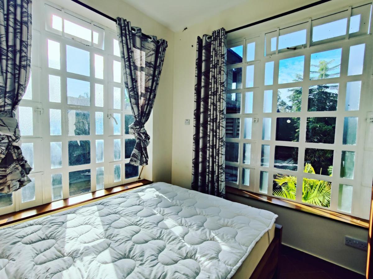 Garden View with detached Bathroom - Housity