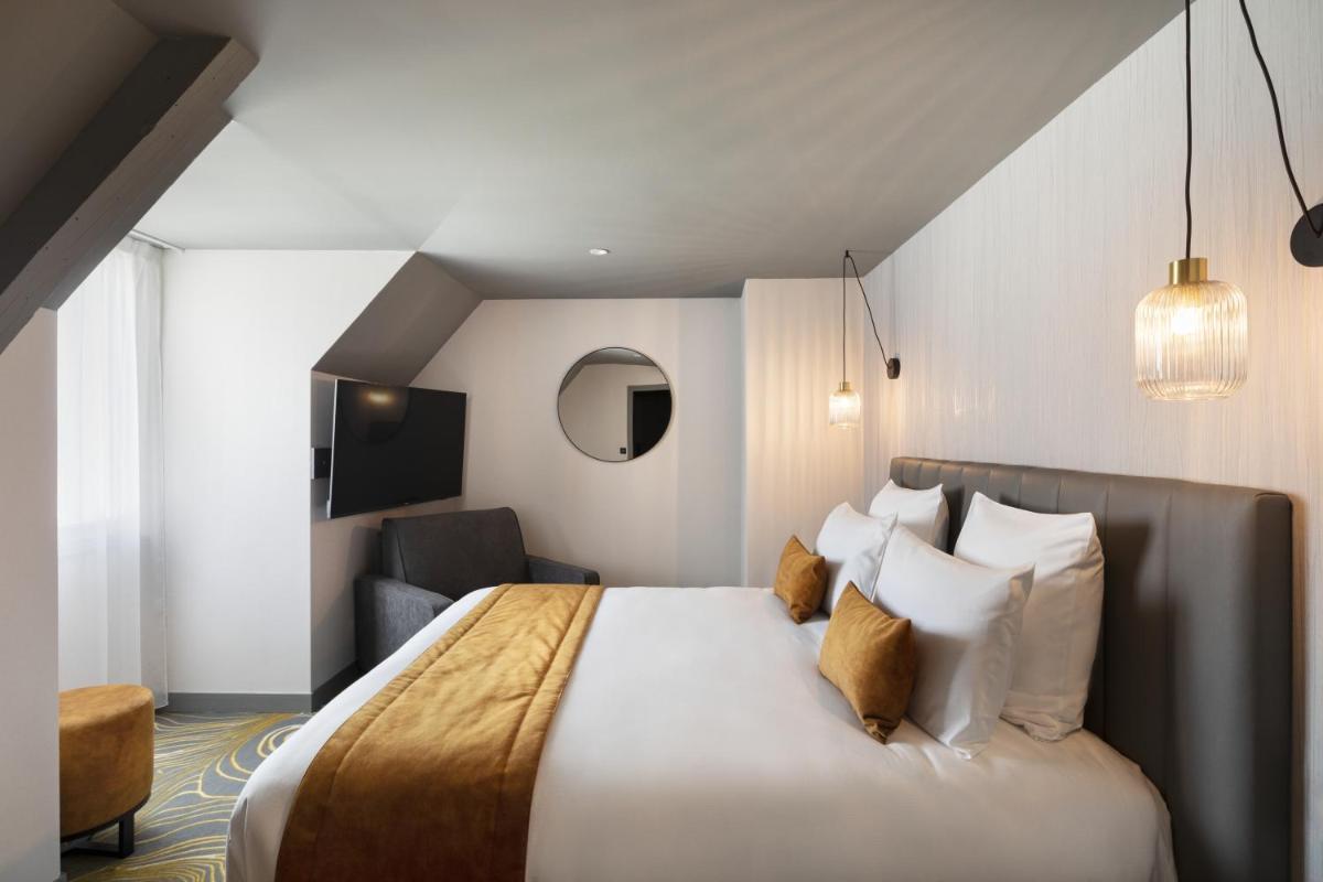 Un ou plusieurs lits dans un hébergement de l'établissement Hôtel & Spa Le Maury, Vannes, The Originals Boutique