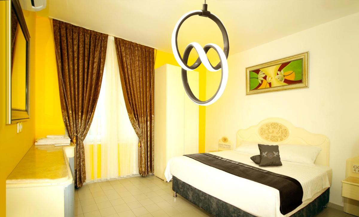 Gold Twins Boutique Hotel - Housity