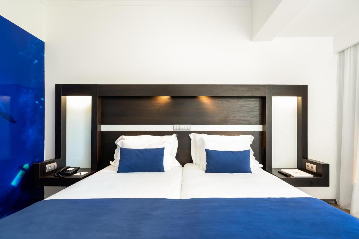 Uma cama ou camas num quarto em Jupiter Algarve Hotel - Beach & Spa
