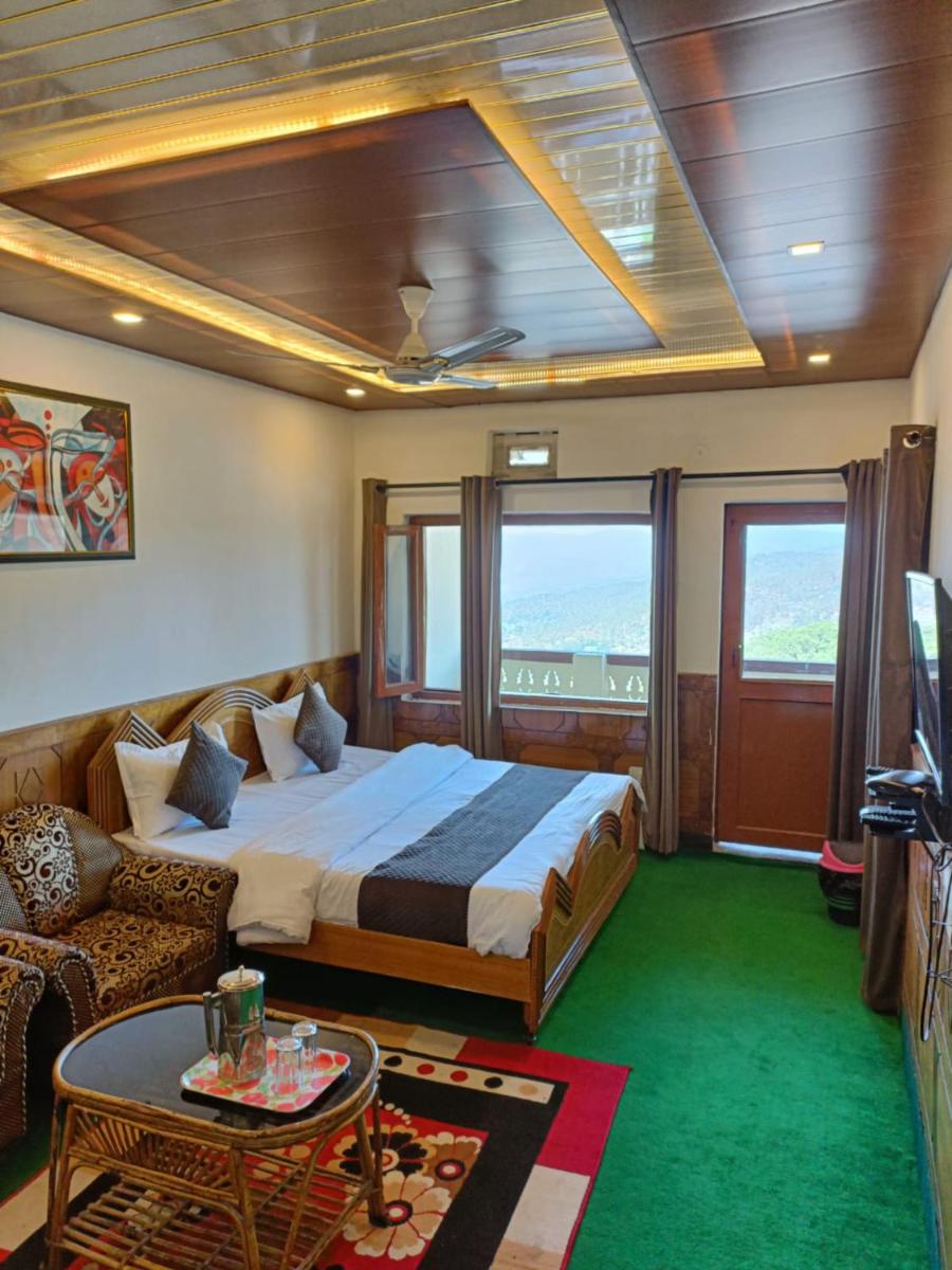 Hotel Tribhuvan Ranikhet Near Mall Road - Mountain View -Parking Facilities - Excellent Customer Service Awarded - Best Seller - Housity