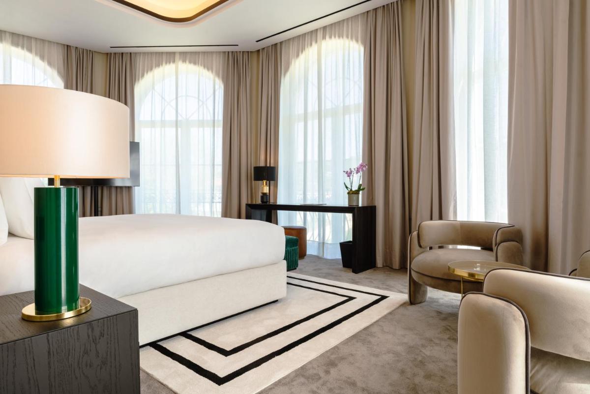 Uma cama ou camas num quarto em Amoure Hotel - The Leading Hotels of the World