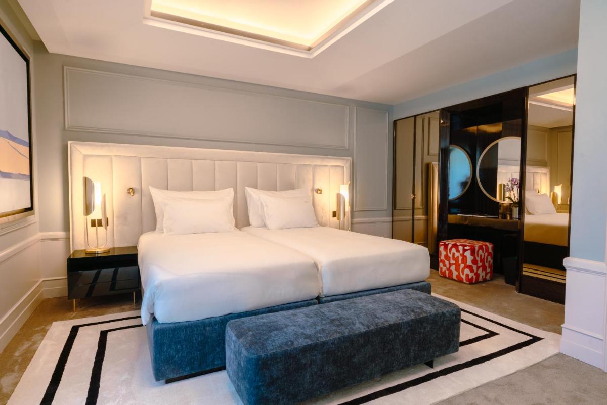Uma cama ou camas num quarto em Amoure Hotel - The Leading Hotels of the World