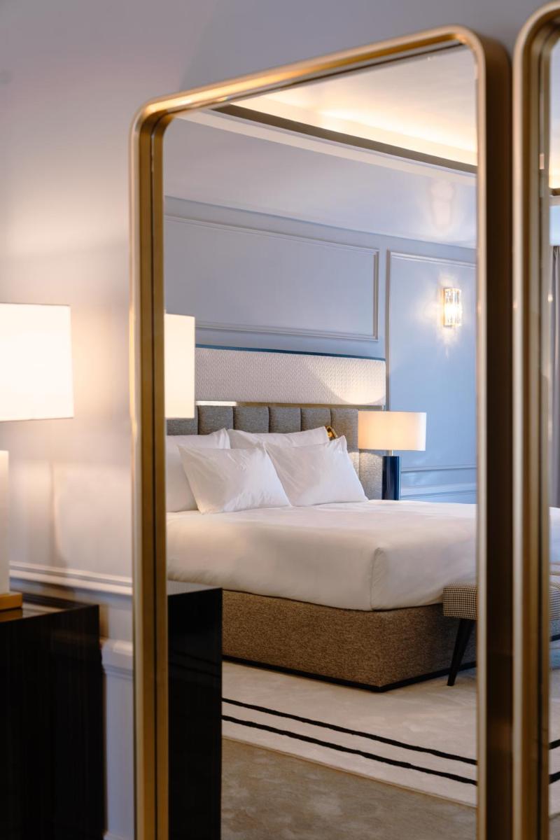Uma cama ou camas num quarto em Amoure Hotel - The Leading Hotels of the World