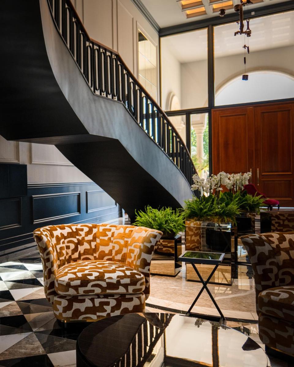 Uma área de estar em Amoure Hotel - The Leading Hotels of the World