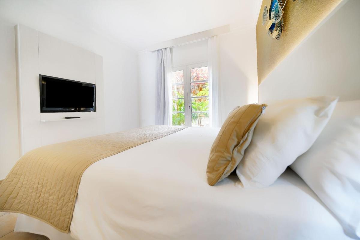 Cama o camas de una habitación en Bull Vital Suites & Spa Boutique Hotel - Only Adults