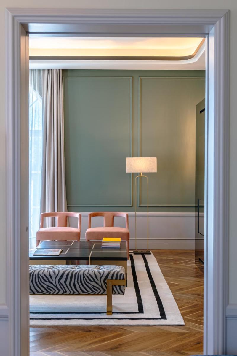 Uma cama ou camas num quarto em Amoure Hotel - The Leading Hotels of the World