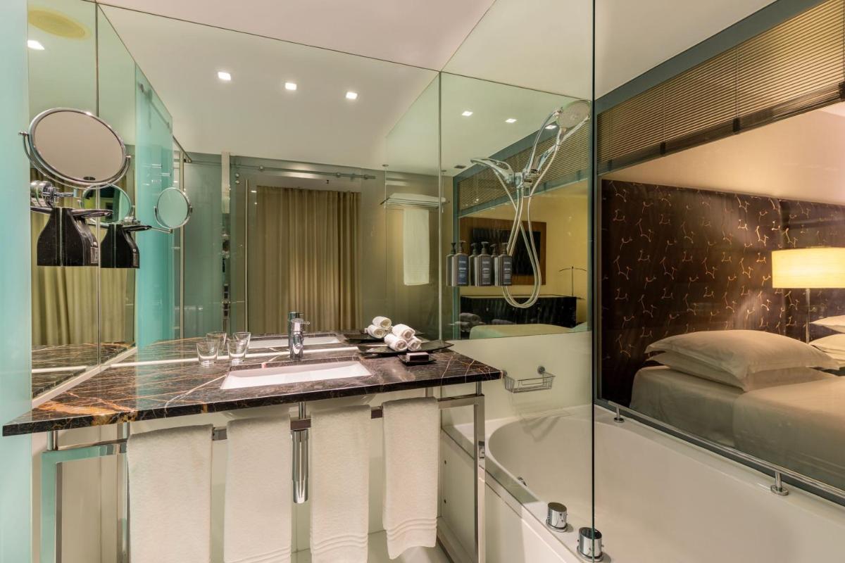 Uma cama ou camas num quarto em Sheraton Lisboa Hotel & Spa