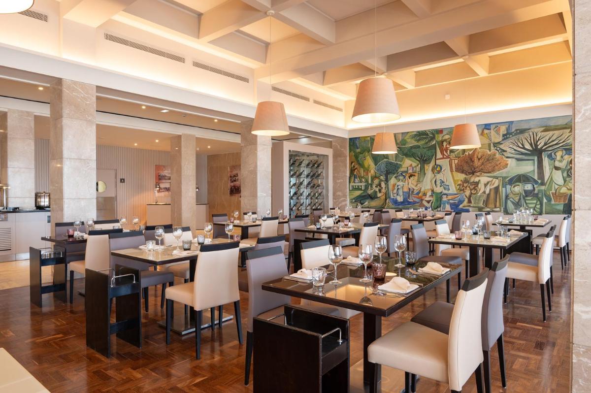 Um restaurante ou outro lugar para comer em Vila Gale Collection Figueira da Foz