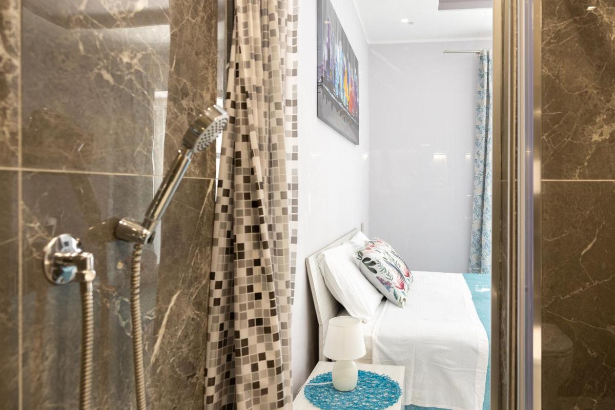 La Perla Luxury Rooms - Housity