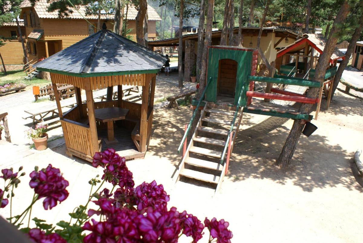 Zona de juegos infantil en Xalet De Prades