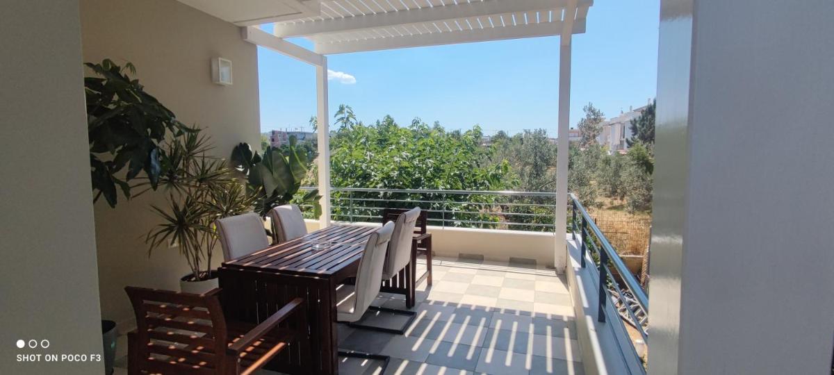 The Bright House a two-storey maisonette in Loutraki - Housity