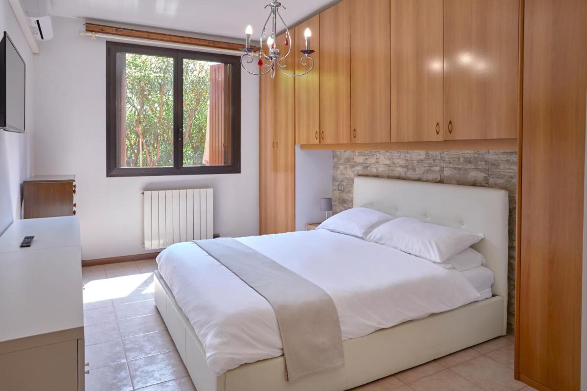Oasi del relax - 100mt lake - wonderful apartment with private garden and pool - Housity