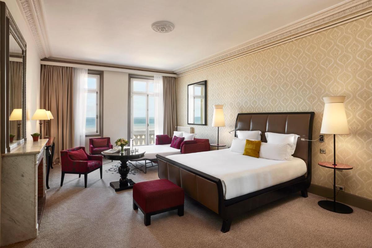 Un ou plusieurs lits dans un hébergement de l'établissement Le Grand Hotel de Cabourg - MGallery Collection