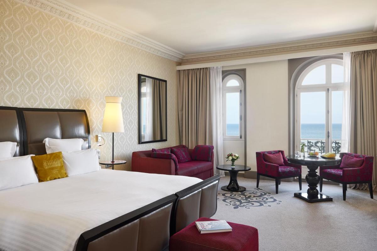 Un ou plusieurs lits dans un hébergement de l'établissement Le Grand Hotel de Cabourg - MGallery Collection