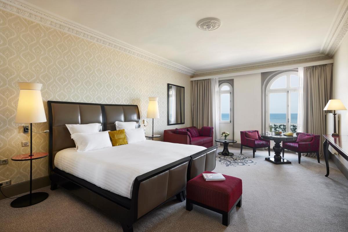 Un ou plusieurs lits dans un hébergement de l'établissement Le Grand Hotel de Cabourg - MGallery Collection