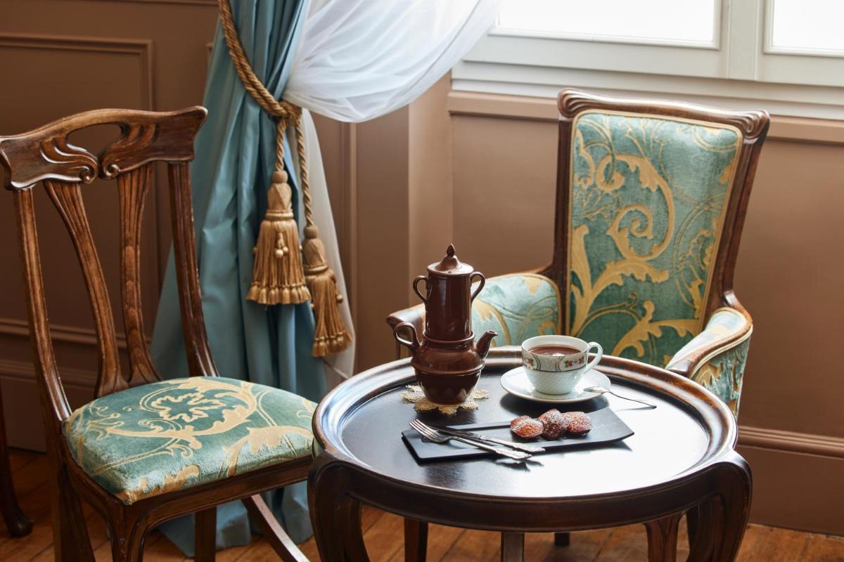 Coin salon dans l'établissement Le Grand Hotel de Cabourg - MGallery Collection