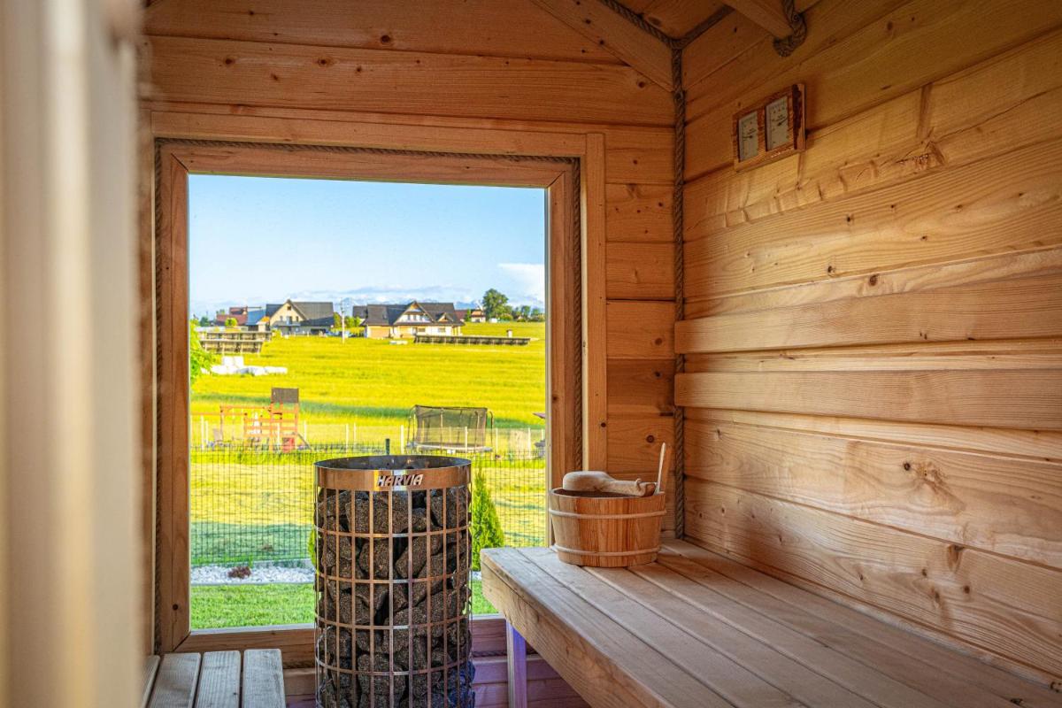 Osada Szaflary - jacuzzi na wyłączność dla każdego domku, ogólnodostępna sauna i plac zabaw w cenie - Housity