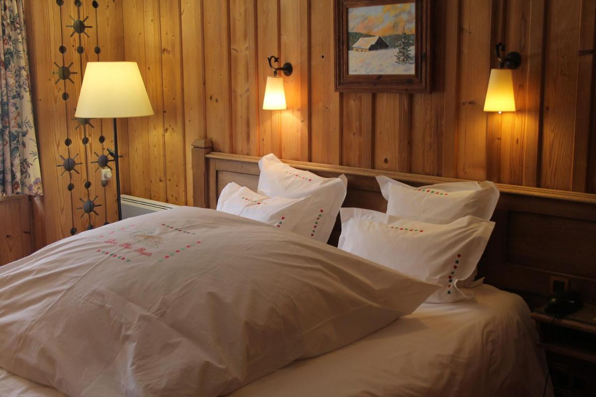 Un ou plusieurs lits dans un hébergement de l'établissement Hôtel-Restaurant Les Bas-Rupts, Singuliers Hôtel