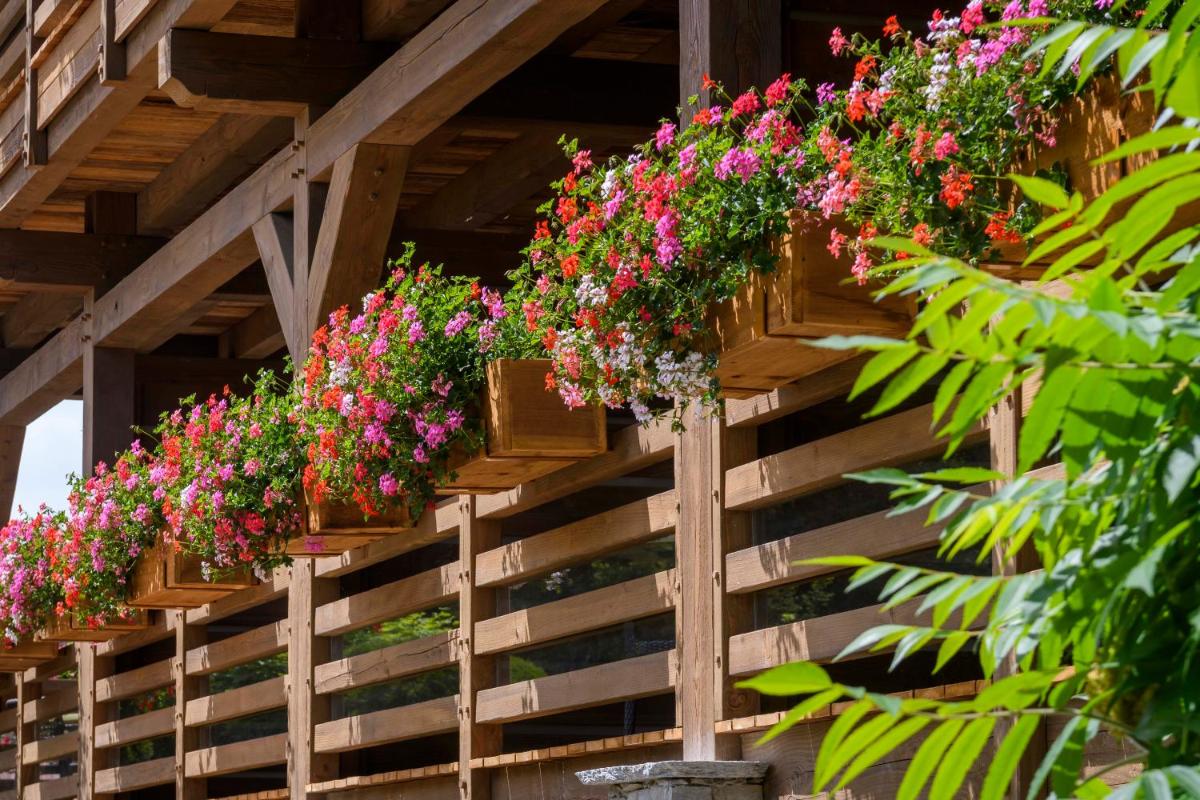 Jardin de l'établissement Hôtel-Restaurant Les Bas-Rupts, Singuliers Hôtel