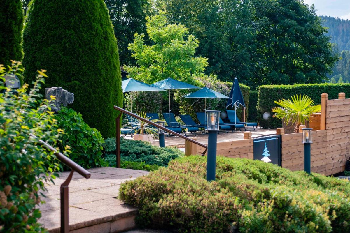Jardin de l'établissement Hôtel-Restaurant Les Bas-Rupts, Singuliers Hôtel