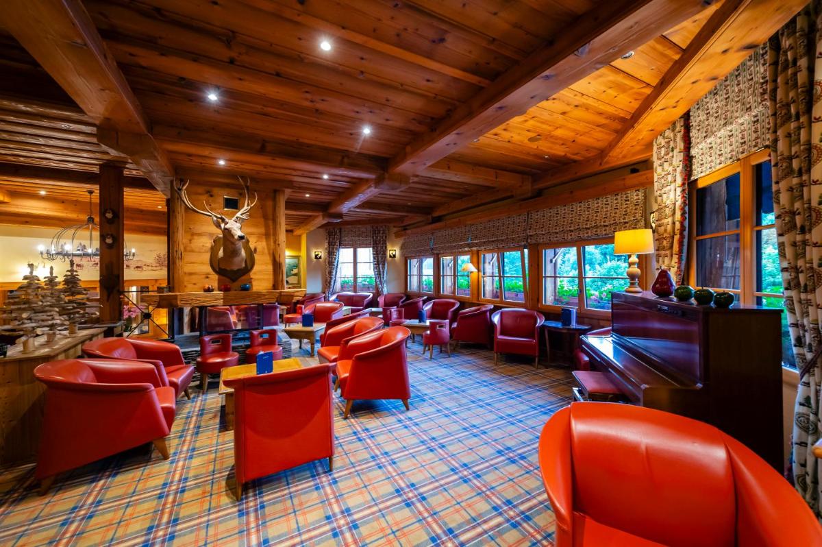 Coin salon dans l'établissement Hôtel-Restaurant Les Bas-Rupts, Singuliers Hôtel