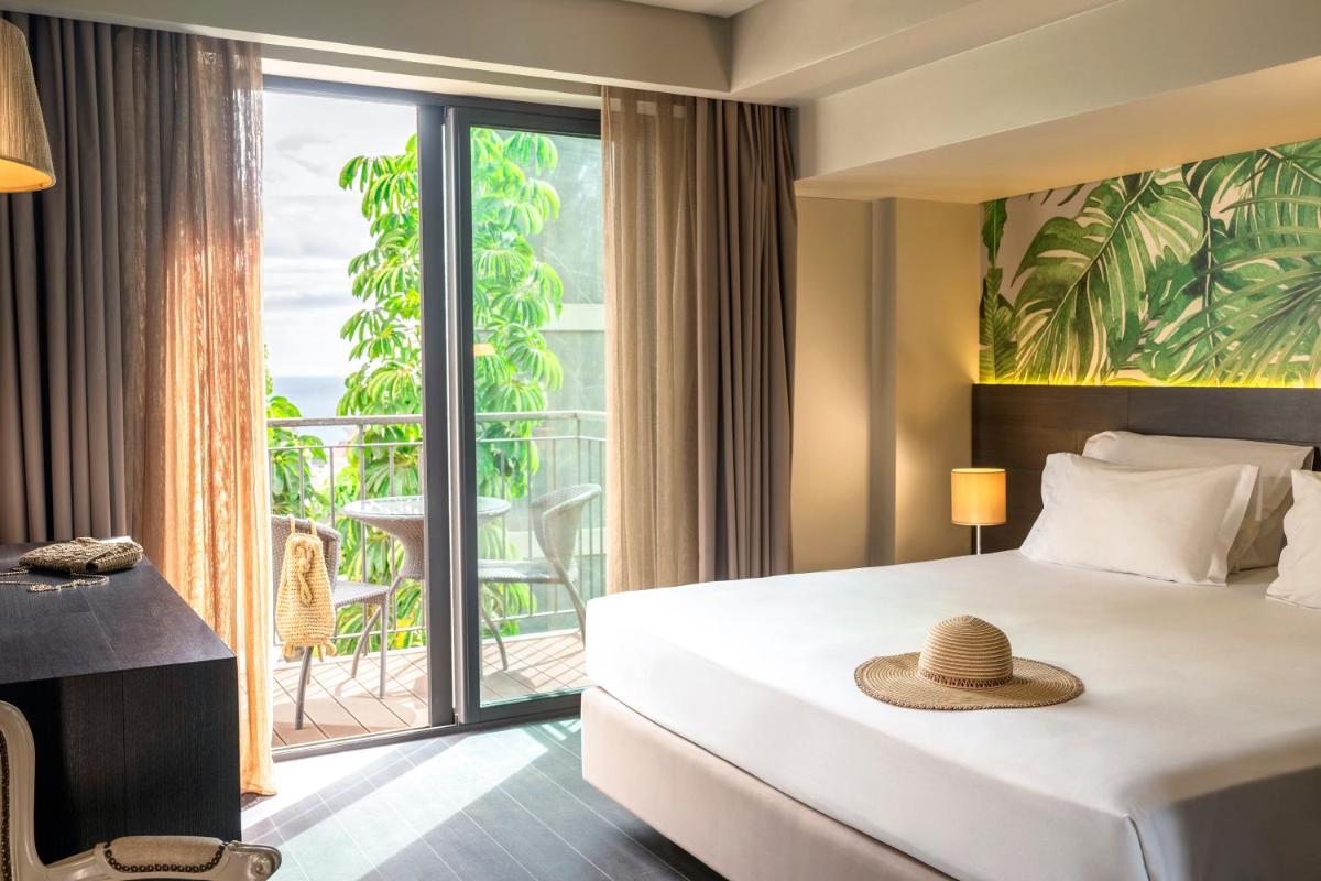Uma cama ou camas num quarto em TUI Blue Gardens - Adults-only - Savoy Signature