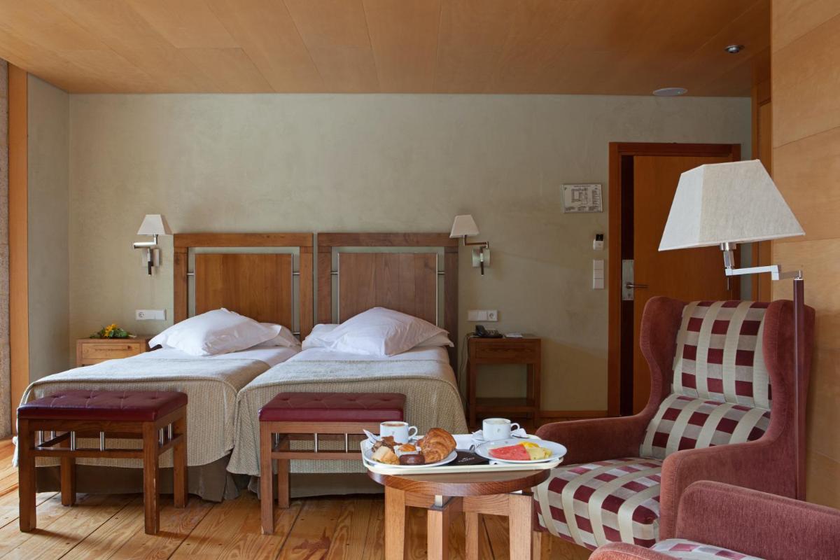 Cama o camas de una habitación en Parador de Santo Estevo