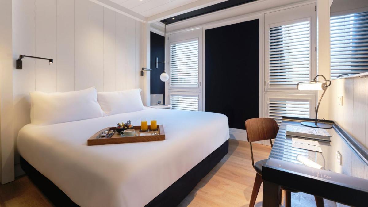 Cama o camas de una habitación en ESTIMAR Valencia