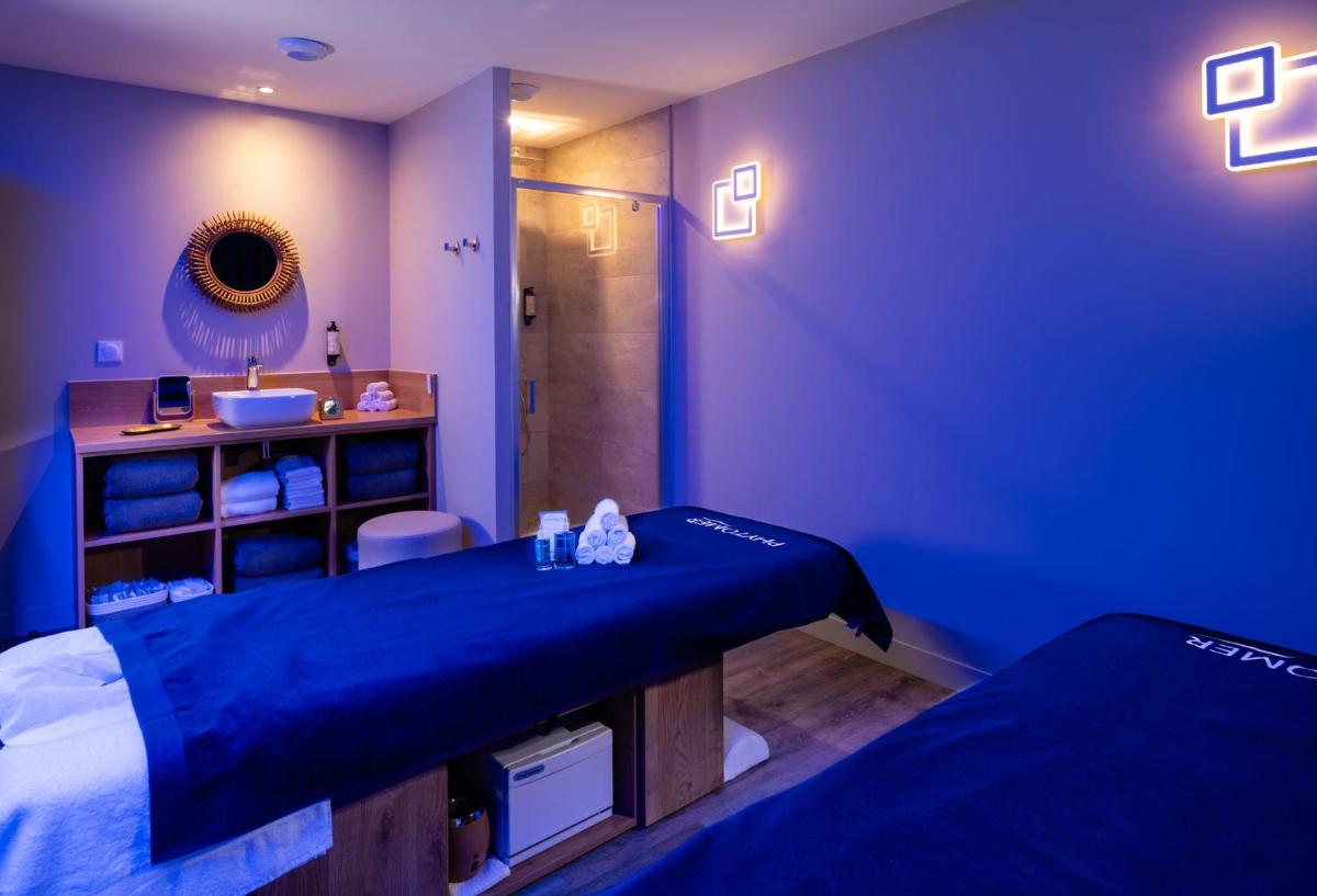 Un ou plusieurs lits dans un hébergement de l'établissement Mas De La Senancole & Spa