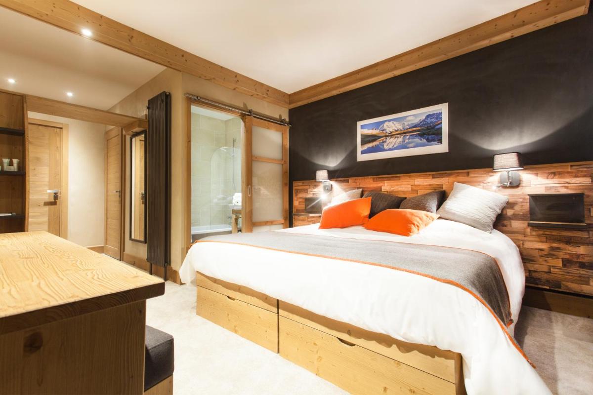 Un ou plusieurs lits dans un hébergement de l'établissement Hôtel Saint Charles Val Cenis