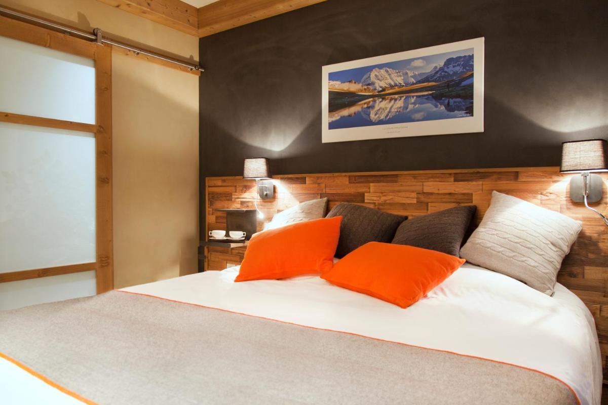 Un ou plusieurs lits dans un hébergement de l'établissement Hôtel Saint Charles Val Cenis