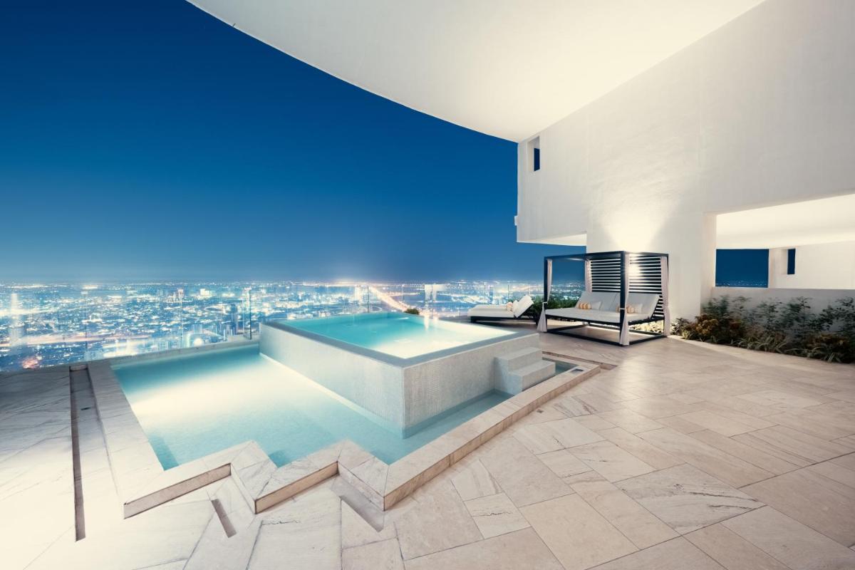 a house with a swimming pool with a view at FIVE Jumeirah Village in Dubai