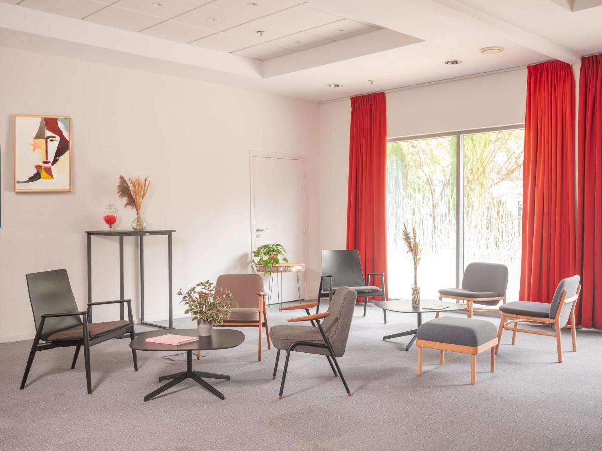 Coin salon dans l'établissement Radisson Blu Hotel Toulouse Airport
